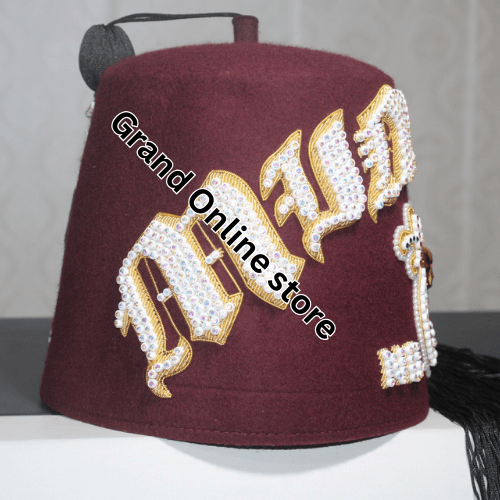 High-quality Shriner Fez adorned with symbolic emblems of the Shriner order. Classic Shriner Fez with intricate embroidery and gold accents.