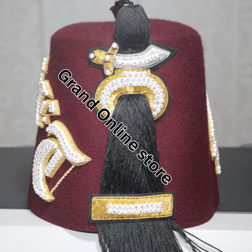 High-quality Shriner Fez adorned with symbolic emblems of the Shriner order. Classic Shriner Fez with intricate embroidery and gold accents.